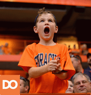 A young Syracuse fan cheers on the Orange during the Maryland game. 