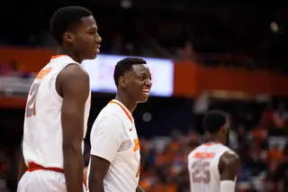 Joseph and Roberson crack a grin during the second half. SU's 38-point second half helped it pull away and secure a third straight win.