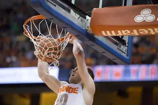SU guard Trevor Cooney goes up for a dunk. His inside scoring was better than his shooting from the outside, where he connected on just two of his 12 3-point attempts. 