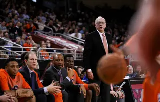 Jim Boeheim looks on from the bench in the second half. His team earned its first win since the university self-imposed a one-year postseason ban.