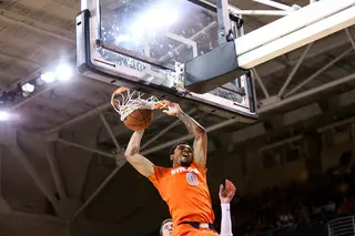 Gbinije throws down an emphatic two-handed dunk. The forward led SU with 21 points on 8-of-11 shooting.