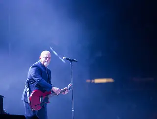 Singer-songwriter Billy Joel starts his concert on Friday night with the song 