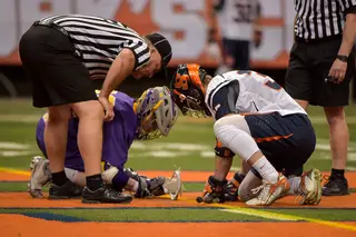 Ben Williams leans into the X to take a faceoff. The sophomore went 24-for-27 on the draw against Albany.
