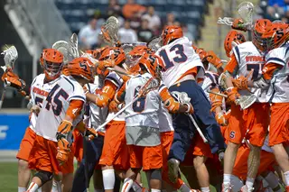 Syracuse celebrates its first-ever ACC title after holding off Duke for a 15-14 win.