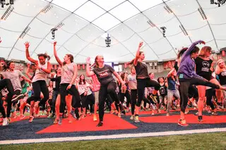Participants dance during Relay For Life in the Carrier Dome. 