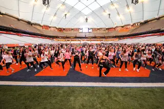 Participants dance during Relay For Life. In addition to dancing and walking around the Dome, student groups such as Otto Tunes performed at the event. 