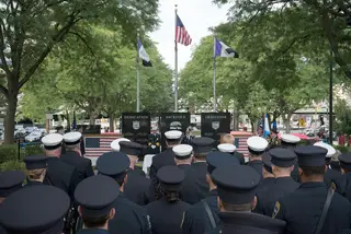 A number of Syracuse first responders look on during Sunday's ceremony.