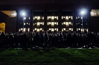 Students gathered outside of Bird Library in preparation for the vigil.