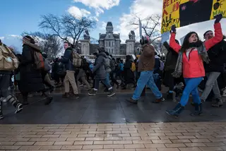 Syracuse students protest on the campus of Syracuse University. The march was in retaliation of President Trump's ban on refugees that was recently passed.