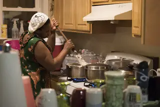 The family cooks a meal to enjoy while they celebrate being together again.