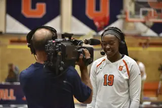 Santita Ebangwese is interviewed after the game. She finished with 11 kills and four blocks.