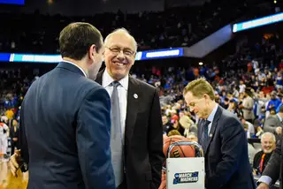 Syracuse head coach Jim Boeheim and Duke coach Mike Krzyzewski embrace before the game. The two are close friends through all their years of coaching.