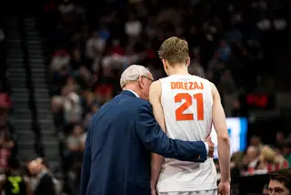 Boeheim chats with Dolezaj, who said after the game he wishes he were more assertive this season. 
