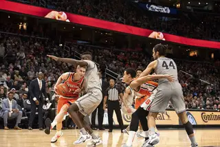 Dolezaj, pictured driving through contact, snagged a Syracuse-high nine rebounds against the Hoyas.