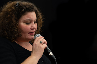 Marianne Solivan, an assistant professor of applied music and performance (jazz voice) in the Setnor School of Music, practices her vocal solo for the Mass during the instrument rehearsal.
