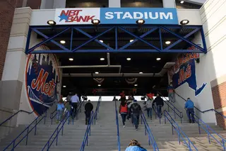 Fans enter NBT stadium for the first Syracuse Mets game of the season. 