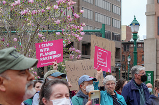 People of all ages gather to share their views on the subject and express that they stand with Planned Parenthood. 