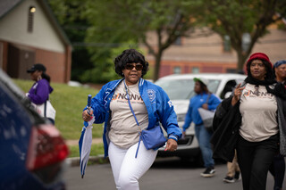 A member of Zeta Phi Beta dances through the Syracuse Victory Parade as part of the Juneteenth celebrations, June 18th, 2022.