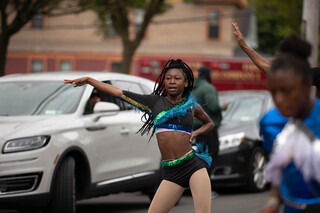 Members of the Show Out Dance Family dance through the Syracuse Victory Parade as part of the Juneteenth celebrations, June 18th, 2022.