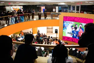 Soccer fans crowd into the Schine Student Center and eagerly huddle around the big screen to watch the games. Finding a seat in the lower level was nearly impossible last week as students rooted for their teams daily at 10 a.m. and 2 p.m.
