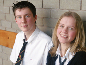 Andrew Mcclune and Ruth McNay, 2002 to 2003 Lockerbie Scholars, wear ties with badges to signify their school honors.  McClune died in 2002 after falling from a seventh floor window.