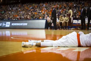 Chris McCullough lies on the baseline after tearing his right ACL during the first half of Sunday's game. The official diagnosis came on Monday and although the freshman is out for the season, he said he'll remain upbeat.