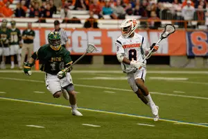 Hakeem Lecky makes a move against Siena on Saturday afternoon in the Carrier Dome. The senior midfielder led a unit that provided a second offensive dimension too hard for the Saints to defend.