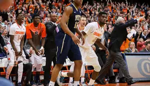 B.J. Johnson reacts to a made shot in the second half. He poured in 11 points on Saturday, and along with Ron Patterson, gave Syracuse its highest scoring output from the bench since Dec. 22.