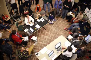 Chancellor Kent Syverud meets with protesters in Crouse-Hinds Hall during their 18-day sit-in in November 2014. Since the sit-in, SU has moved forwarded on a number of the group's demands.
