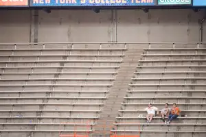 Syracuse's attendance has been dismal the last two years. During one game last year, three fans were the only ones in a section of bleachers. 