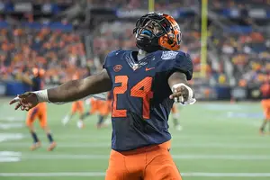 Shyheim Cullen celebrates after the Orange won the Camping World Bowl on Friday.