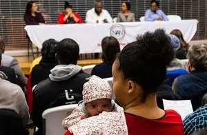 Brittany Peterson, a mother in Syracuse, attended the “State of the Community” meeting, where Syracuse citizens discussed violence against children and teens in 2018. 