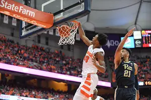 Elijah Hughes goes up for a slam in SU's last matchup against the Panthers.