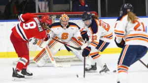Jessica DiGirolamo (22) tallied two assists in Syracuse's first ever CHA championship. 