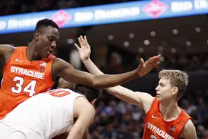 Syracuse went without a field goal for nearly seven minutes in the second half, but scored 20 points in overtime to pull away.