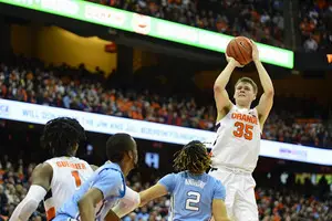 Buddy Boeheim's 22 points helped spark an 9-0 run to trim an early SU deficit, but Cole Anthony (2) and UNC eventually overpowered the Orange.