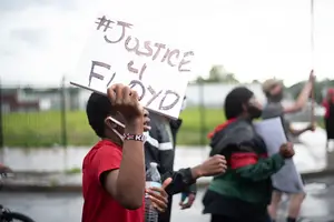 People protest following George Floyd's murder in May 2020.