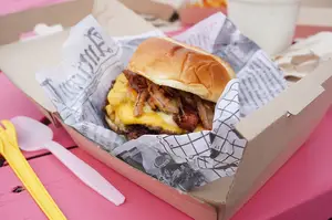 Loded restaurant sells double-patty smash burgers, fried chicken sandwiches, mac and cheese and fries with various toppings like fried pork belly, grilled shrimp and a fried egg.