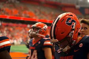 Syracuse will reportedly hire Virginia offensive coordinator Robert Anae and quarterbacks coach Jason Beck to replace Sterlin Gilbert.