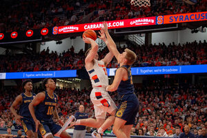 Joe Girard scored 28 points to help Syracuse recover from another slow start and earn a sixth ACC win against the Yellow Jackets.