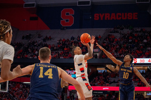 Our beat writers are split on whether Syracuse will pick up its first Quad I win of the season against North Carolina.