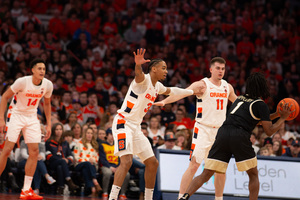 Judah Mintz and Joe Girard sit atop Syracuse's 2-3 zone as Wake Forests Tyree Appleby looks to pass. Throughout the season, Wake Forest has averaged 53.6% shooting from beyond the arc, but tonight, it mustered just 40% in the loss 