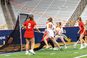 Katie Goodale sends a shot past Ellie Horner to put Syracuse up 6-1 in the opening quarter. The goal was Goodale's first career score