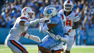Head coach Dino Babers lamented the officials' decision to grant UNC's punter a first-down spot on the second drive of the game.