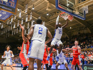 Duke's Mark Mitchell (No. 25) dropped a career-high 21 points in its 86-66 win over Syracuse.