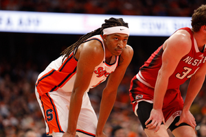 Syracuse held NC State to just 36 percent shooting from the field, helping it defeat the Wolfpack 77-65.