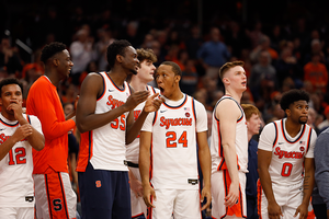 Our beat writers are split on whether Syracuse can defeat Wake Forest on the road Saturday.