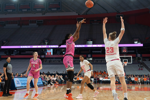 Alyssa Latham tallied 12 points and eight rebounds off the bench, helping No. 23 Syracuse defeat GT in a tight contest.