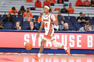 Dominique Camp's knee injury forced her to the sideline, but her NIL deal with ISlide has created new opportunities for her to contribute to Syracuse.