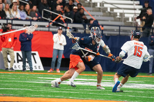 No. 4 UVA's Connor Shellenberger tallied nine points (four goals and five assists) in Syracuse's 18-17 win.
